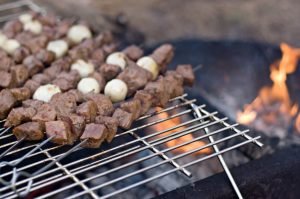 grill grates over campfire